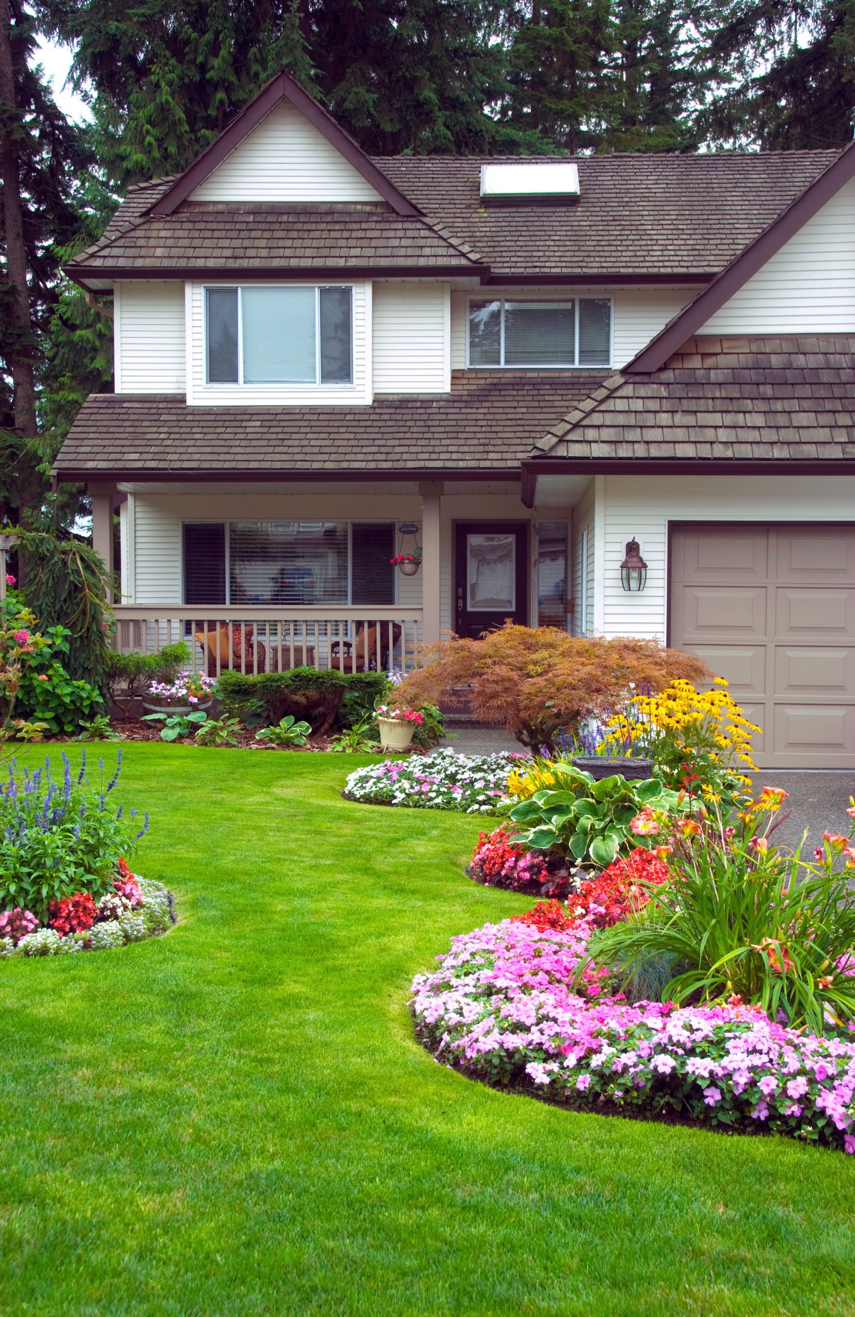 Large beige house with green grass ready for home inspection services